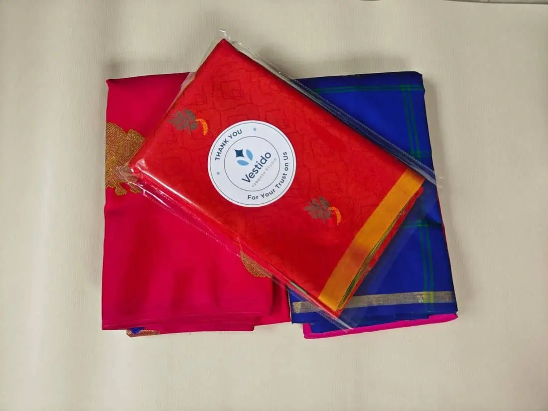 Close view of silk saree zari borders finished at Vestido Fabwash Studio