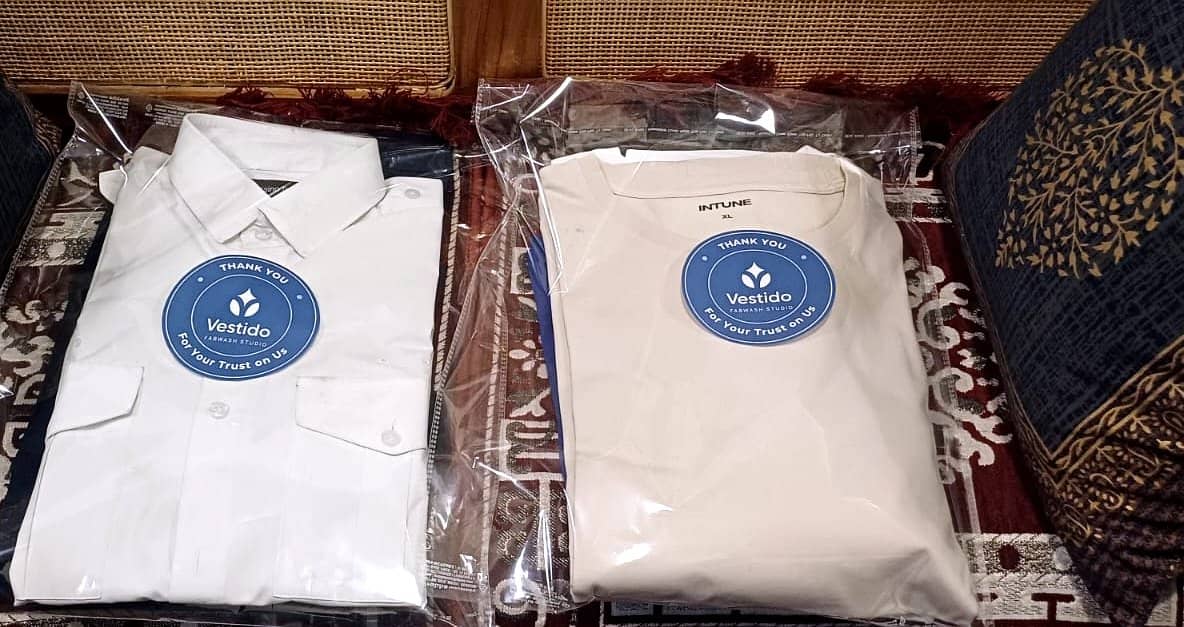 Folded shirts packaged by Vestido Fabwash Studio